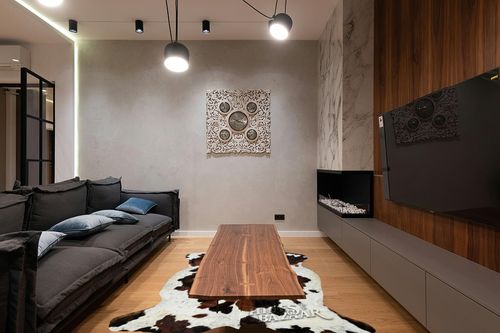 Tricolor Cowhide Rug Classic Brown, Black and White Color Mix, Natural Leather Hide, Area Rug (6x7ft) in Dark Wood Living Room with Black Couch