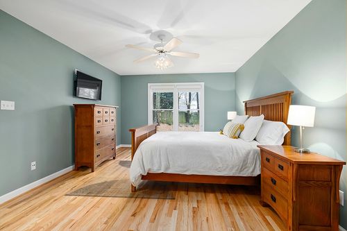 Nourison Astra Machine Washable Mid-Century Modern Ivory Blue 5'3" x 7' Area Rug, Easy-Cleaning, Non Shedding, Bed Room, Living Room, Dining Room, Kitchen (5x7) in Teal and Orange Wood Bedroom