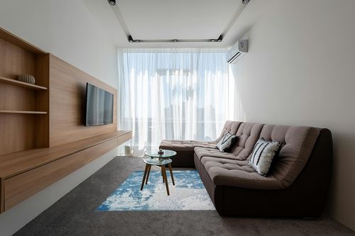 LUXE WEAVERS Abstract Blue 5x7 Area Rug in Grey Living Room with Brown Couch