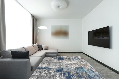 LUXE WEAVERS Euston Collection 7679 Blue 8x10 Abstract Area Rug in Modern Living Room with Grey Couch