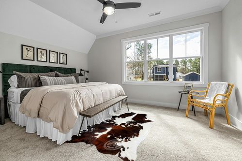 Sunshine Cowhides Genuine Tricolor Cowhide Rug - Luxurious Cow Rug for Bedroom, Living Room, and Home Decor Enthusiasts - Masterpiece of Style and Functionality - XL 6x7-8ft (180x220cm) in Grey Traditional Bedroom with King Bed