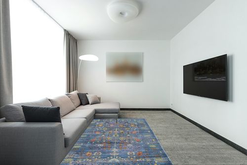 SAFAVIEH Valencia Collection Area Rug - 5' x 8', Blue & Multi, Boho Chic Distressed Design, Non-Shedding & Easy Care, Ideal for High Traffic Areas in Living Room, Bedroom (VAL108M) in Modern Living Room with Grey Couch