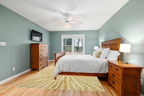 Wonnitar Abstract Firework 8x10 Rugs, Machine Washable Area Rugs Modern Ombre Bedroom Rug, Low Pile Kids Play Rug Swirl Print Carpet Rug for Living Room Classroom (Yellow/Gold, 8 x 10) in Teal and Orange Wood Bedroom