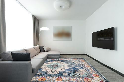 SAFAVIEH Monaco Collection Area Rug - 8' x 10', Navy & Light Blue, Boho Chic Medallion Distressed Design, Non-Shedding & Easy Care, Ideal for High Traffic Areas in Living Room, Bedroom (MNC243N) in Modern Living Room with Grey Couch