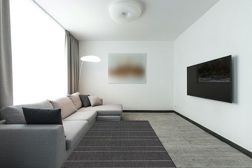 nuLOOM Alaina Indoor/Outdoor Striped Area Rug, 5x8, Black in Modern Living Room with Grey Couch