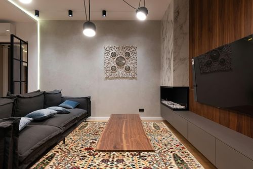 nuLOOM Dasilva Tribal Fringe Area Rug, 8x10, Olive in Dark Wood Living Room with Black Couch