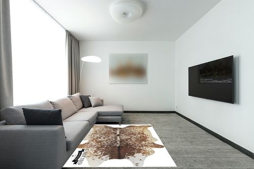 Gaucho Cowhides Natural Snowie Brown and White in Modern Living Room with Grey Couch