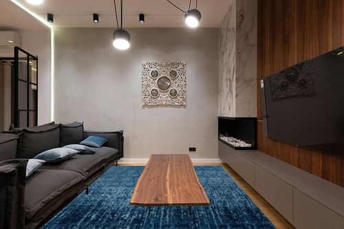 SAFAVIEH Retro Collection Area Rug - 9' x 12', Light Blue & Blue, Modern Abstract Design, Non-Shedding & Easy Care, Ideal for High Traffic Areas in Living Room, Bedroom (RET2770-6065) in Dark Wood Living Room with Black Couch
