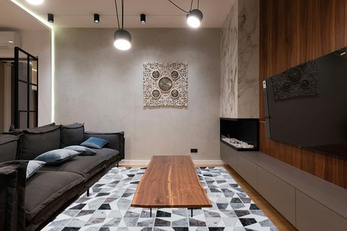 DECOMALL Coronado 8x10ft Area Rugs, Modern Geometric Faux Cowhide Patchwork Rug, Machine Washable Non Slip Carpet for Living Room Bedroom Dinning Room,8x10ft Multi in Dark Wood Living Room with Black Couch