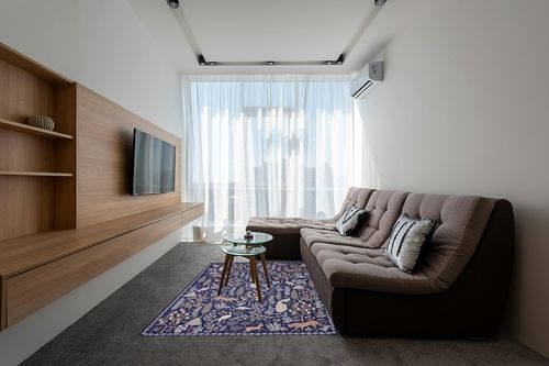 Loloi Rifle Paper Co. x Menagerie Navy 5'-0" x 7'-6" Area Rug in Grey Living Room with Brown Couch