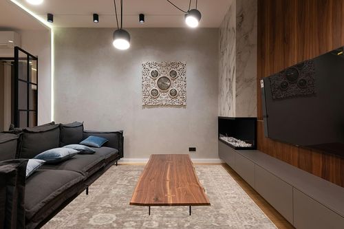 Loloi Chris Loves Julia Louisa Collection LOI-03 Taupe/Ivory 7'-10" x 10', .38" Pile Height, Area Rug in Dark Wood Living Room with Black Couch