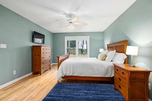 Nourison Essentials Indoor/Outdoor Navy Blue 4' x 6' Area Rug, Easy Cleaning, Non Shedding, Bed Room, Living Room, Dining Room, Backyard, Deck, Patio (4x6) in Teal and Orange Wood Bedroom