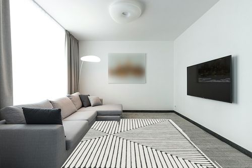 RUGGABLE x Jonathan Adler Washable Rug - Perfect Modern Area Rug for Living Room Bedroom Kitchen - Child Friendly - Stain & Water Resistant - Inkdrop Black & Ivory White 8'x10' (Standard Pad) in Modern Living Room with Grey Couch
