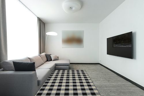 Garland Rug Country Living Buffalo Plaid Area Rug, 5-Feet by 7-Feet, Black/Ivory in Modern Living Room with Grey Couch