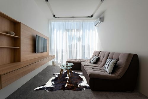 rodeo Cowhide Rug Dark Brindle Size 6x8 Feet Dc in Grey Living Room with Brown Couch