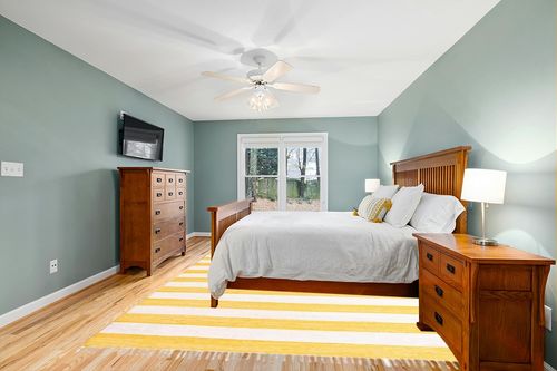 Unique Loom Chindi Rag Collection Area Rug - Striped (9' x 12' 2" Rectangle, Yellow and Ivory) in Teal and Orange Wood Bedroom