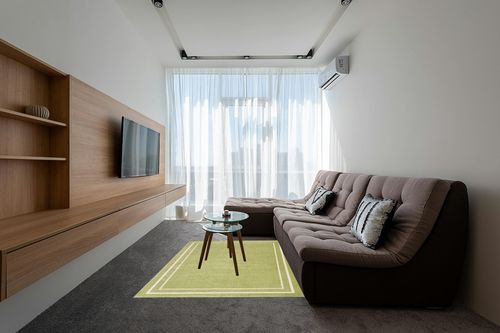Ebern Designs Essentials Solid Green Ivory Area Rug Ebern Designs Rug Size ... in Grey Living Room with Brown Couch