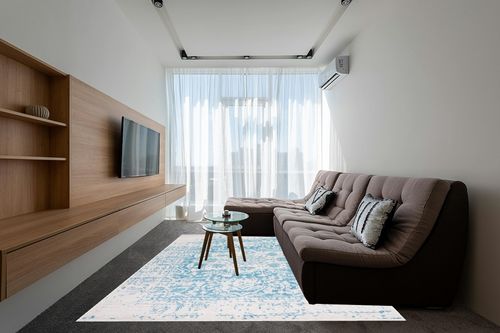 SAFAVIEH Madison Collection Area Rug - 8' x 10', Teal & Ivory, Snowflake Medallion Distressed Design, Non-Shedding & Easy Care, Ideal for High Traffic Areas in Living Room, Bedroom (MAD603J) in Grey Living Room with Brown Couch
