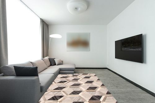 eCarpet Gallery Hand-Knotted | Area Rug for Living Room, Bedroom | Cowhide Patchwork Accent Grey Rug 5'6" x 7'7" | 350680 in Modern Living Room with Grey Couch
