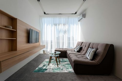 LUXE WEAVERS Abstract Distressed Green 5x7 Area Rug for Living Room in Grey Living Room with Brown Couch