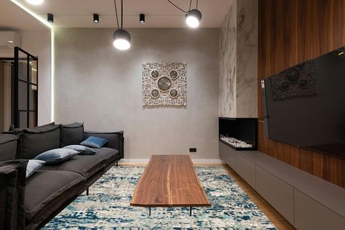 SAFAVIEH Madison Collection Area Rug - 8' x 10', Grey & Blue, Modern Abstract Design, Non-Shedding & Easy Care, Ideal for High Traffic Areas in Living Room, Bedroom (MAD460K) in Dark Wood Living Room with Black Couch