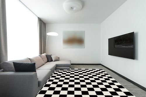 Luxe Weavers Modern Checkered Area Rug Black 8x10 Stain Resistant Carpet for Living Room in Modern Living Room with Grey Couch