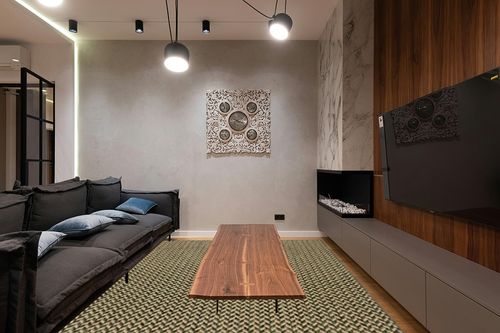 nuLOOM Camryn Herringbone Indoor/Outdoor Area Rug, 8x10, Green in Dark Wood Living Room with Black Couch