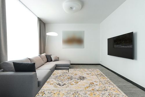 Artistic Weavers Delney Oriental Area Rug,7'10" x 10',Yellow in Modern Living Room with Grey Couch