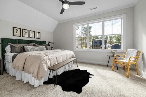 Faux Fur Cowhide Rugs (5 * 7 ft), Machine Washable Cow Print Area Carpet Black Color with Non-Slip Suede Backing, Durable & No Shedding in Grey Traditional Bedroom with King Bed