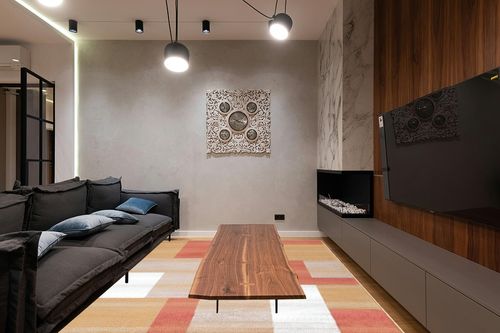 SUPERIOR Clifton Mid-Century Modern Geometric Polypropylene Indoor Area Rug with Jute Backing, 8' X 10', Ginger in Dark Wood Living Room with Black Couch