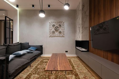 SAFAVIEH Anatolia Collection Area Rug - 8' x 10', Brown & Green, Handmade Traditional Oriental Wool, Ideal for High Traffic Areas in Living Room, Bedroom (AN512F) in Dark Wood Living Room with Black Couch