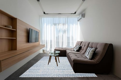SAFAVIEH Micro-Loop Collection Area Rug - 8' x 10', Blue & Ivory, Handmade Moroccan Boho Tribal Wool, Ideal for High Traffic Areas in Living Room, Bedroom (MLP502M) in Grey Living Room with Brown Couch