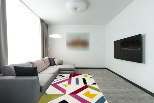 SAFAVIEH Hollywood Collection Area Rug - 5'3" x 7'6", Ivory & Rose, Mid-Century Modern Design, Non-Shedding & Easy Care, Ideal for High Traffic Areas in Living Room, Bedroom (HLW700A) in Modern Living Room with Grey Couch