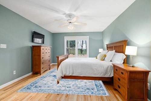 VIPBED Large Area Rug,8X10 Washable Rug for Living Room,Ultra-Thin Low Pile Vintage Medallion Area Rugs with Anti-Slip Backing, Boho Farmhouse Rug for Home Decor(Multi-Blue,8'x10') in Teal and Orange Wood Bedroom