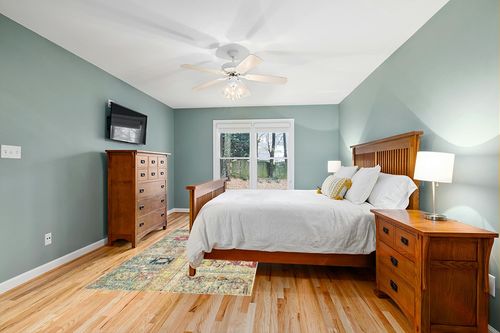 Unique Loom Monterey Collection Vintage Bohemian Inspired with Colorful Tribal Design Area Rug (5' 0 x 8' 0 Rectangular, Multi/ Beige) in Teal and Orange Wood Bedroom