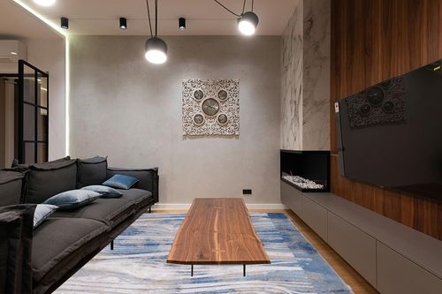Safavieh Palma Collection Area Rug - 9' x 12', Beige & Blue, Modern Abstract Design, Non-Shedding & Easy Care, Ideal for High Traffic Areas in Living Room, Bedroom (PAM316A) in Dark Wood Living Room with Black Couch