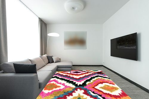 nuLOOM Handmade Carnival Abbey Shaggy Area Rug, 7' 6" x 9' 6", Multi in Modern Living Room with Grey Couch