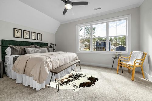 HIDES BAZAAR Light Tricolor Cowhide Rug, Premium Quality Genuine Leather Cow Hide, White, Brown and Black Color Mix Area Rug (5x7 ft) in Grey Traditional Bedroom with King Bed