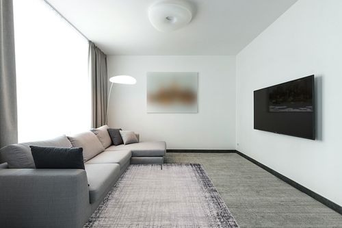 SAFAVIEH Skyler Collection Area Rug - 5'1" x 7'6", Ivory Grey & Black, Modern Design, Ideal for High Traffic Areas in Living Room, Bedroom, Dining (SKY113A-5) in Modern Living Room with Grey Couch