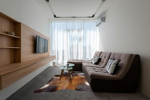 Sunshine Cowhides Genuine Mahogany Brown Cowhide Rug - Luxurious Cow Rug for Bedroom, Living Room, and Home Decor Enthusiasts - Masterpiece of Style and Functionality - XL 6x7-8ft (180x240cm) in Grey Living Room with Brown Couch