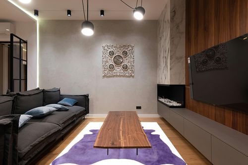 Natural Geneva Cowhide Area Rugs for Living Room and Bedroom | Handmade 100% Cow Rug with Low Pile | Shed-Resistant Home and Office Rug, Purple, 6 Ft x 7 Ft in Dark Wood Living Room with Black Couch