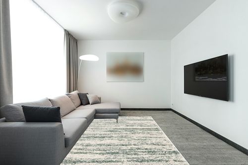 SAFAVIEH Hudson Shag Collection Area Rug - 6' x 9', Ivory & Green, Modern Design, Non-Shedding & Easy Care, 2-inch Thick Ideal for High Traffic Areas in Living Room, Bedroom (SGH206Y) in Modern Living Room with Grey Couch