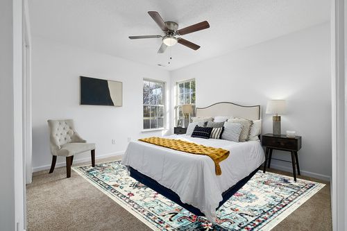 SAFAVIEH Madison Collection Area Rug - 9' x 12', Cream & Blue, Boho Chic Medallion Distressed Design, Non-Shedding & Easy Care, Ideal for High Traffic Areas in Living Room, Bedroom (MAD473B) in White and Yellow Modern Bedroom