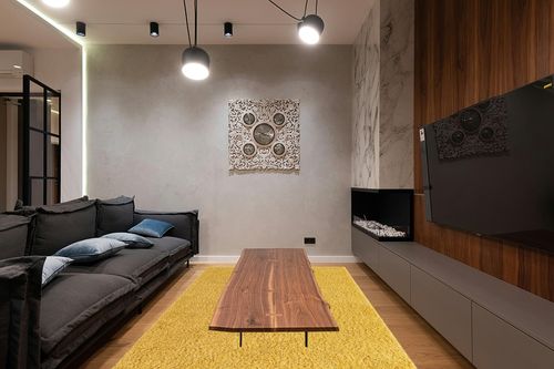 Yellow, 6x9 Feet fluffy rug in Dark Wood Living Room with Black Couch