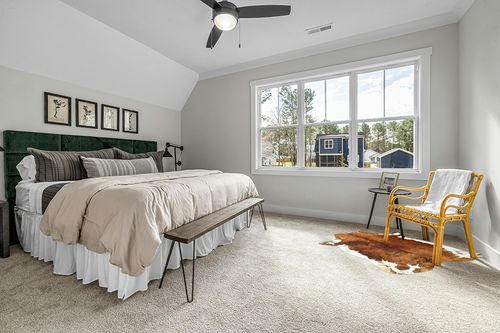 DweIke Faux Cowhide Rug, 4.6ft x 5.2ft Luxury Cow Print Rugs, Faux Fur Animal Cow Hide Carpet for Bedroom, Living Room, Office, Home Decor, Non-Slip Cute Cowhide Rug, Brown in Grey Traditional Bedroom with King Bed