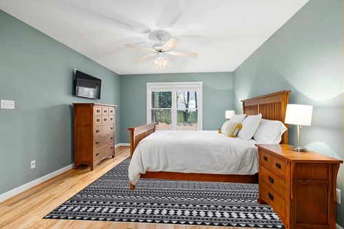 RUGSREAL Large 9 x 12 Area Rug for Living Room Boho Area Rug Non Slip Low Pile Area Rug Machine Washable Area Rug Farmhouse Carpet for Bedroom Home Office, 9' x 12' in Teal and Orange Wood Bedroom
