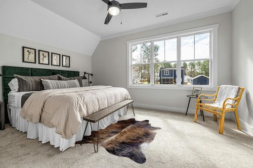 Sunshine Cowhides Genuine Dark Brindle Cowhide Rug - Luxurious Cow Rug for Bedroom, Living Room, and Home Decor Enthusiasts - Masterpiece of Style and Functionality - 6x6-7ft (180x210cm) in Grey Traditional Bedroom with King Bed