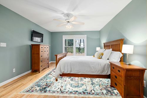 SAFAVIEH Madison Collection Area Rug - 9' x 12', Cream & Blue, Boho Chic Medallion Distressed Design, Non-Shedding & Easy Care, Ideal for High Traffic Areas in Living Room, Bedroom (MAD473B) in Teal and Orange Wood Bedroom