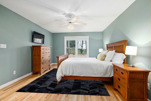 New Cowhide Rug Leather. Animal Skin Patchwork Area Carpet (8 X 10) in Teal and Orange Wood Bedroom