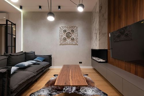 Sunshine Cowhides Salt and Pepper Tricolor Cowhide Rug Approx 5ft x 7ft 150cm x 210 cm in Dark Wood Living Room with Black Couch